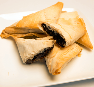 plate with chocolate filled phyllo turnovers