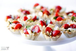 caprese filled phyllo shells on stand