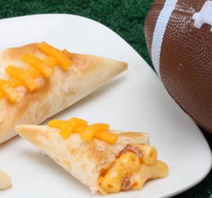 game day appetizers - mac n cheese phyllo footballs on plate